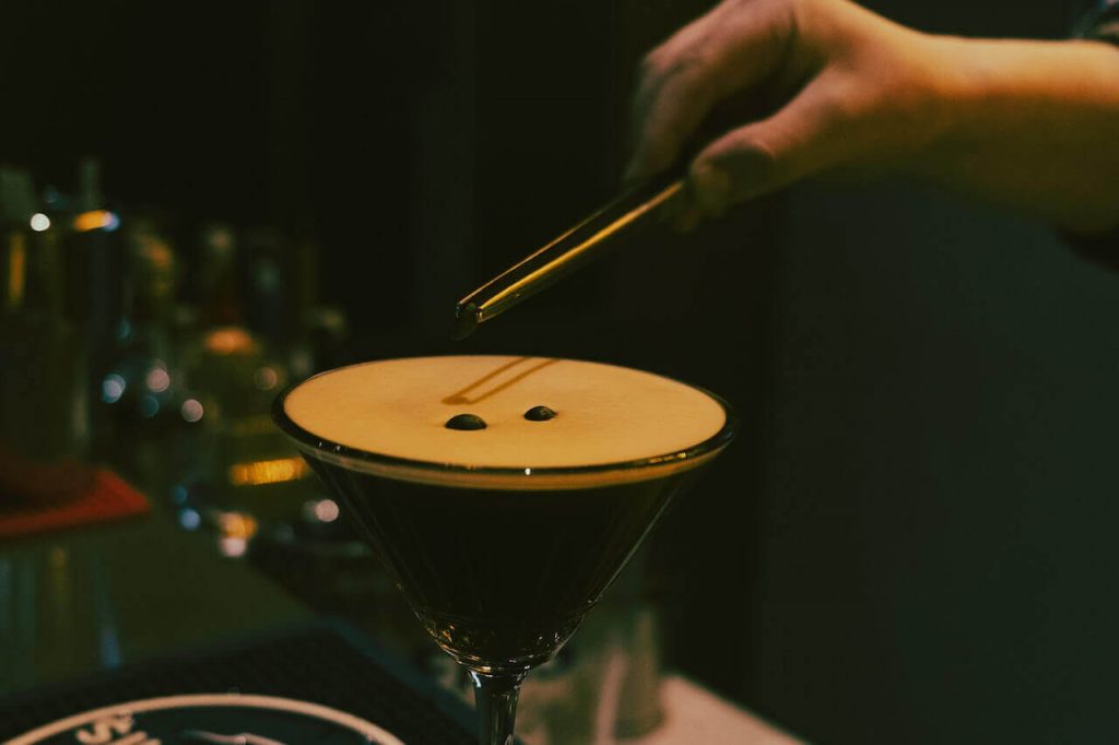 An image featuring an espresso martini, one of the many coffee-infused cocktail recipes.